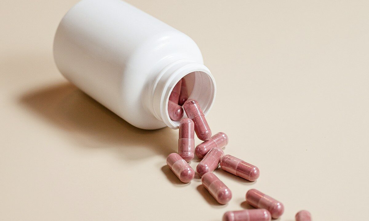 a white bottle of medicine